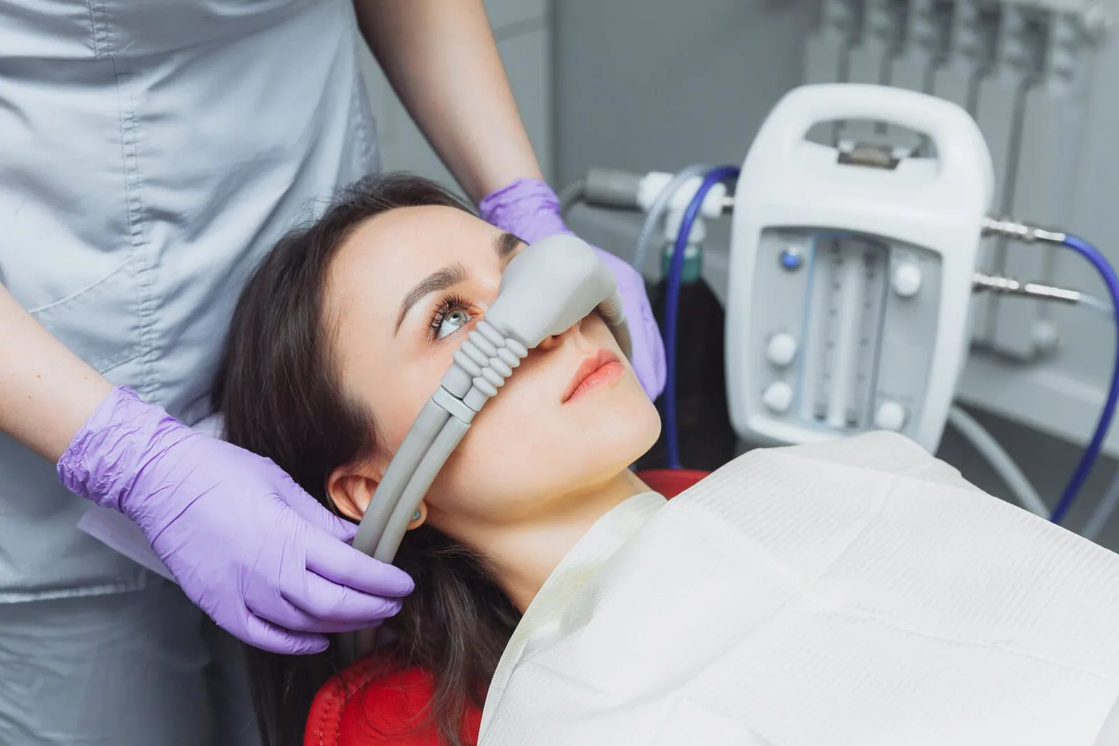 Patient relaxing comfortably during a sedation dental visit